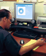 Scutt at desk